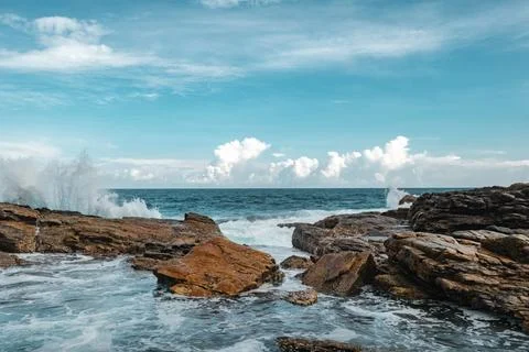 Dramatic Coastal Landscape With Ocean Waves Crashing Against Rocks Stock Photos