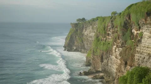 Dramatic Coastal Landscape Steep Cliffs, Waves, and Foam at the Edge of the.. Stock Footage 254932275