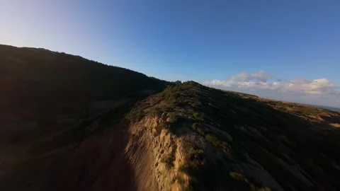 Dramatic coastal scene with crashing surf and layered cliffs Stock Footage 344577710