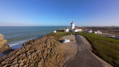 Dramatic coastal scene with historic lighthouse at Peniche Video stock 346076980