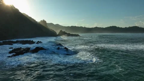 Dramatic Coastal Seascape with Waves at Sunset Stock Footage 338313487