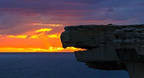A dramatic coastal sunset Stock Photos