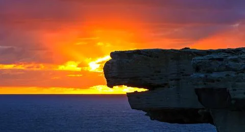 A dramatic coastal sunset Stock Photos
