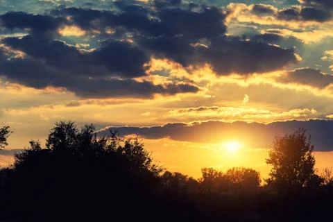 Dramatic colorful sky with cloud at sunset 写真素材