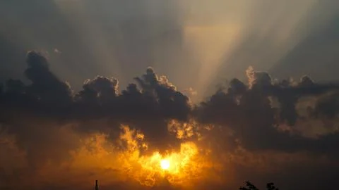 Dramatic Colorful Sunset or Sunrise Sky. Clouds with Sunrays. Cloudscape Na.. Stock Photos