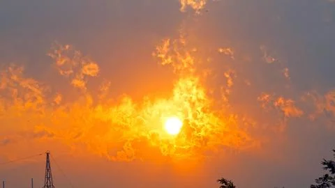 Dramatic Colorful Sunset or Sunrise Sky. Clouds with Sunrays. Cloudscape Na.. Stock Photos