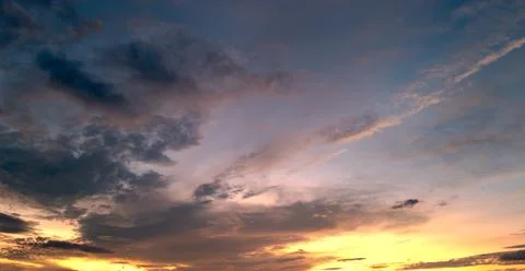 Dramatic Colorful Sunset Sky. Clouds with Sunrays. Cloudscape Sunset Background Stock Photos