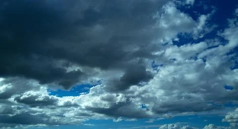 Dramatic Colorful Sunset Sky. Clouds with Sunrays. Cloudscape Nature Background Stock Photos