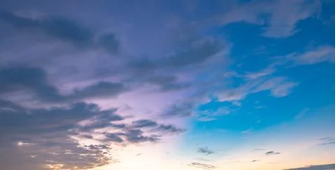 Dramatic Colorful Sunset Sky. Clouds with Sunrays. Cloudscape Sunset Background 스톡 사진