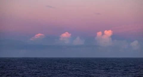 Dramatic Colorful Sunset Sky over North Atlantic Ocean. Cloudscape Nature Stock Photos