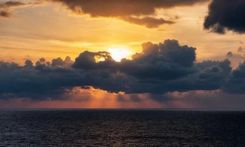 Dramatic Colorful Sunset Sky over Mediterranean Sea. Cloudscape Background 写真素材