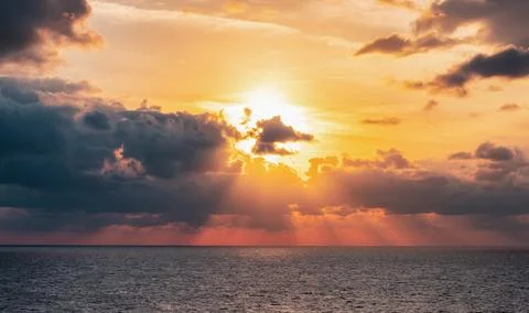 Dramatic Colorful Sunset Sky over Mediterranean Sea. Cloudscape Background Stock-Fotos