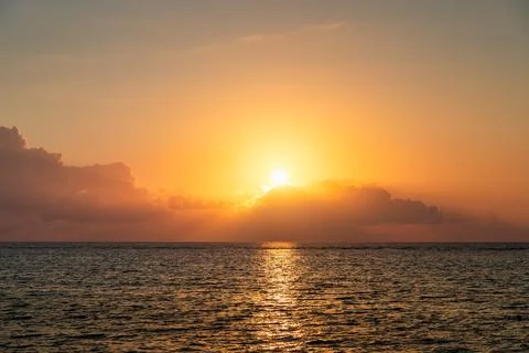 Dramatic colorful sunset sky over sea. Cloudscape nature background. Beauti.. 写真素材