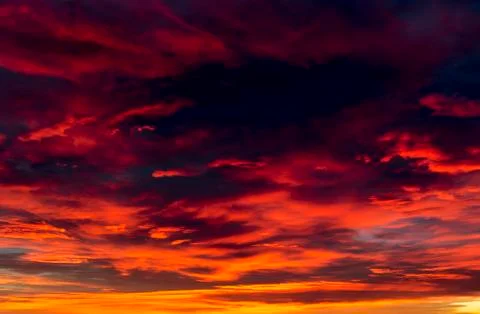 Dramatic colourful cloud formations at sunset; Calgary, Alberta, Canada 写真素材