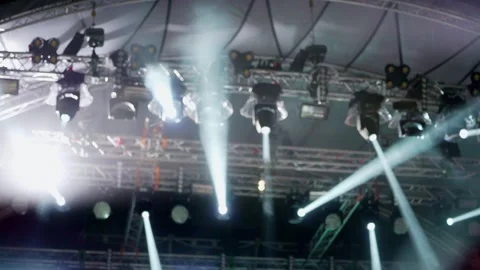 Dramatic Concert Stage Lights Beaming Through Smoke Stock-Footage 331826791