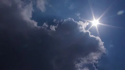 Dramatic Contrast of Light and Dark Clouds in a Blue Sky Stock Footage 295740988