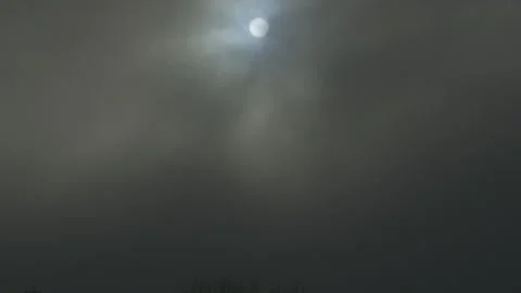 Dramatic contrast sky snowflakes blizzard bright sun winter Видео 258082879