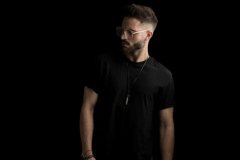 Dramatic cool guy with glasses looking to side Stock Photos