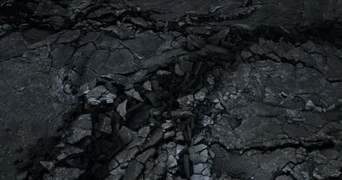 Dramatic cracks in ground in Icelands volcano eruption site, aerial view night Stock Footage 263215114