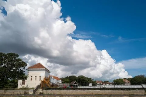 Dramatic cumulonimbus clouds towering over the promenade of West cliff Ramsga Stock Photos