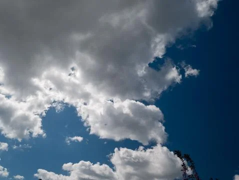 Dramatic Cumulus Clouds in Blue Sky 스톡 사진