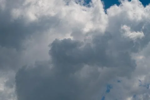 Dramatic cumulus clouds filling a blue sky Stock Photos