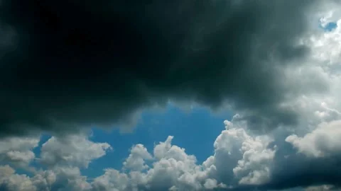 Dramatic Cumulus Cloudscape with Blue Sky Patches 動画素材 309545046