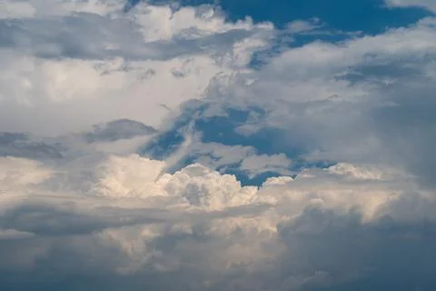 Dramatic cumulus cloudscape with layered sky Stock Photos