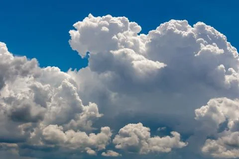 Dramatic cumulus cloudy blue sky background vivid Stock Photos