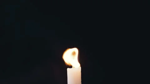 The Dramatic Dance of Candle Flames Creates an Inspiring Atmosphere of Warmth Stock Footage 312014325