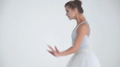 Dramatic dance, elegant female in a white tutu, dance ballet and perform Stock Footage 143377327