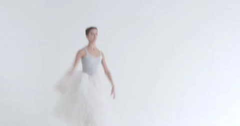 Dramatic dance, elegant female in a white tutu, dance ballet and perform Stock Footage 143524650