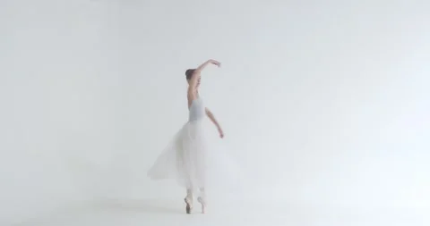 Dramatic dance, elegant female in a white tutu, dance ballet and perform Stock Footage 159945028