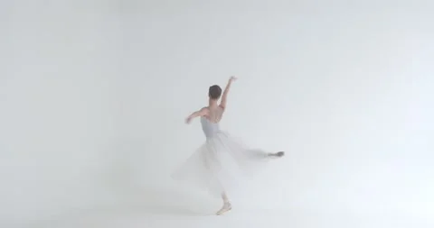 Dramatic dance, elegant female in a white tutu, dance ballet and perform Stock Footage 162368947