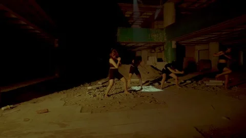 Dramatic Dance Performance in Abandoned Space Stock Footage 294191740