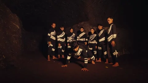 Dramatic Dance Performance in a Cave Stock Footage 296688017