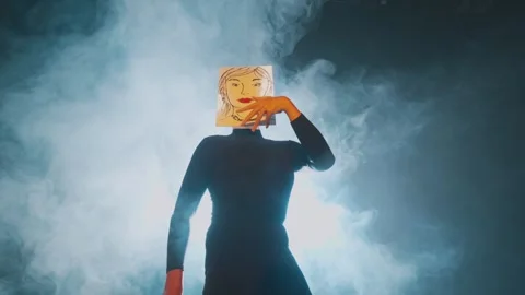 Dramatic Dance Performance with Mask and Smoke Stock Footage 296586723