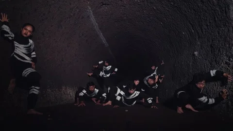 Dramatic Dance Performance in a Tunnel Stock Footage 296687924