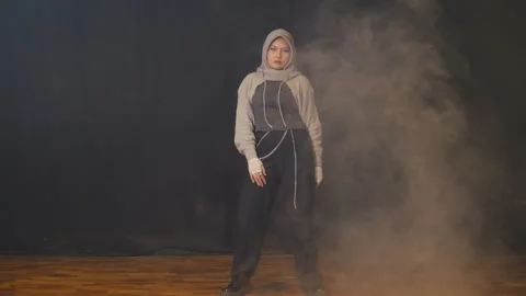 Dramatic Dance Pose in Smoky Atmosphere Stock Footage 283663997