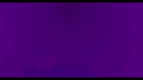 Dramatic dark background with warm glowing light Stock Footage 329269610