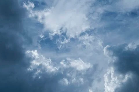 Dramatic dark blue sky with heavy clouds background. Foto stock