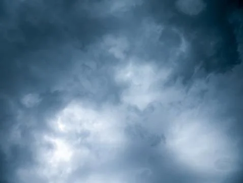 Dramatic Dark Blue Stormy Sky with Heavy Clouds Before Rain, Moody Monsoon .. Stock Photos