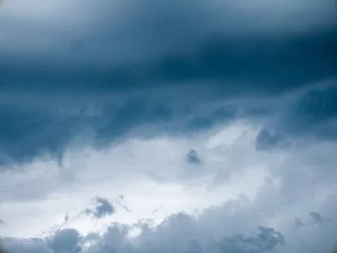Dramatic Dark Blue Stormy Sky with Heavy Clouds Before Rain, Moody Monsoon .. Stock Photos