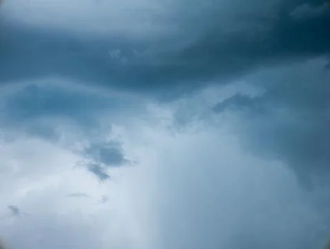 Dramatic Dark Blue Stormy Sky with Heavy Clouds Before Rain, Moody Monsoon .. Stock Photos