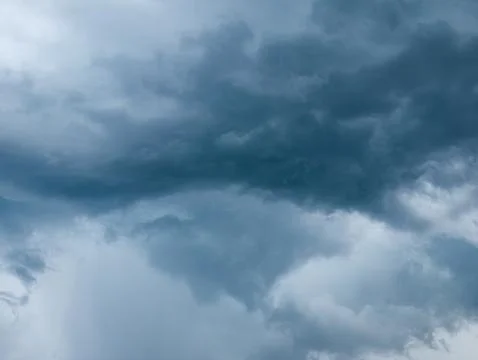 Dramatic Dark Blue Stormy Sky with Heavy Clouds Before Rain, Moody Monsoon .. 写真素材