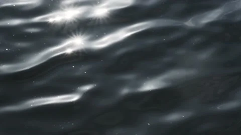 Dramatic dark blue water surface wave sun light vibrant glow closeup. Stormy Stock Footage 167975910