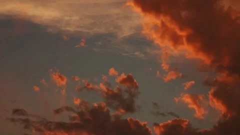 Dramatic dark clouds background,Beautiful 4K Time lapse of Majestic sunrise or s Stock Footage 240053455