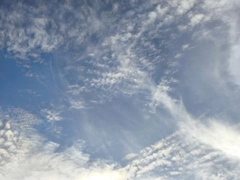 Dramatic dark clouds on blue sky background and texture Stock Photos