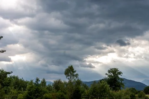 Dramatic dark clouds landscape Stock Photos