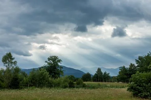 Dramatic dark clouds landscape Stock Photos
